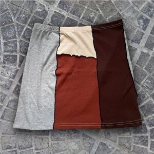 Contrast stitch color block mini skirt